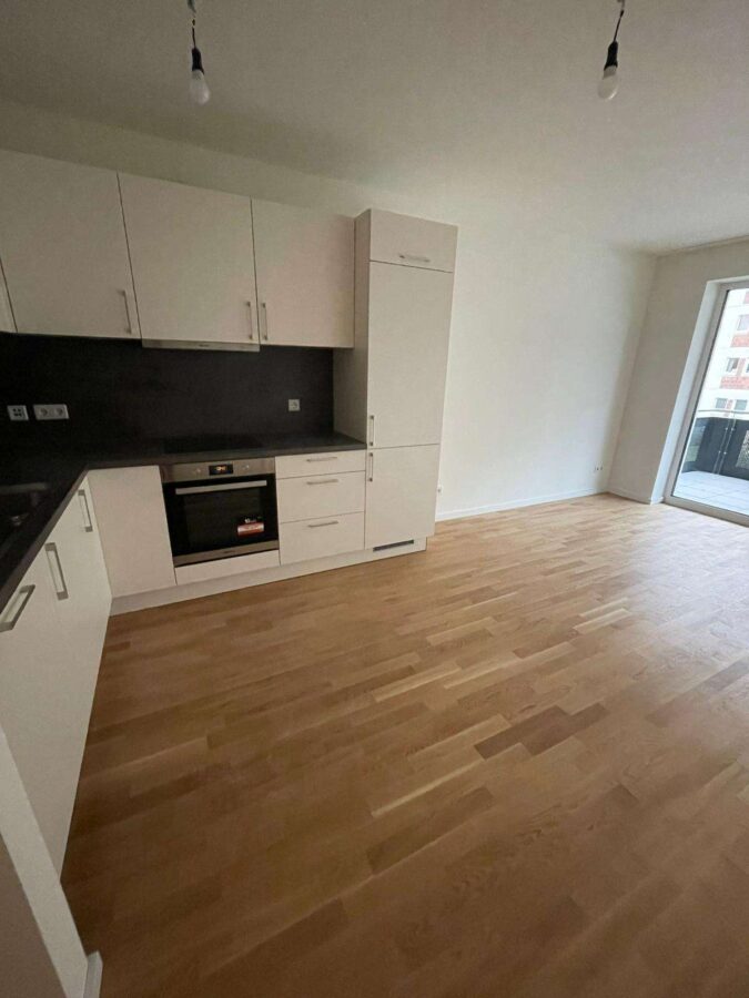 KfW 40-Neubau-Wohnung mit EBK, Balkon, Echtholzparkett, HWR, Fahrstuhl, Tiefgarage - Küche
